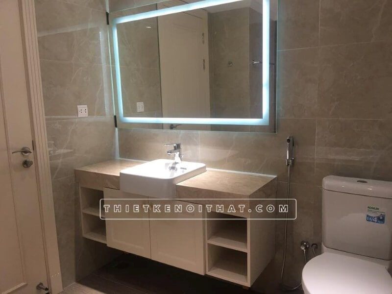 Việc lắp đặt tủ gỗ công nghiệp dưới lavabo trong phòng vệ sinh phòng tắm chung cư Dcapital Trần Duy Hưng Cầu Giấy Hà Nội đã được thi công.